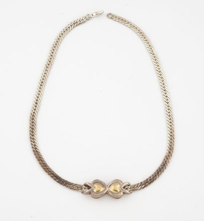  Silver (800) and yellow gold (750) necklace with an English knot, centered on a...