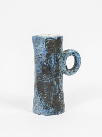 JACQUES BLIN (1920-1995) Pitcher with handle.

In blue glazed ceramic, wiped and...
