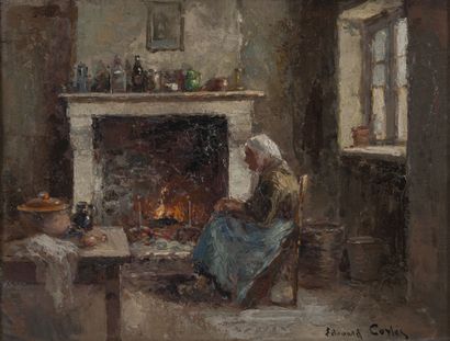 Edouard CORTES (1882-1969) Vieillle femme assise au coin du feu.

Huile sur panneau....