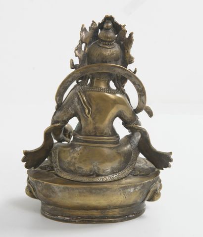 SINO-TIBET, fin XIXème - début du XXème siècle Jambhala en bronze assis et couronné...