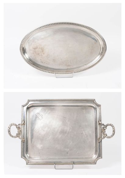 Two silver plated metal trays : 
- one oval...