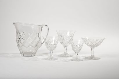 SAINT-LOUIS Part of cut crystal glass service including:

-11 champagne glasses (2...