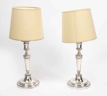 Pair of silver plated metal torches. 
Mounted...