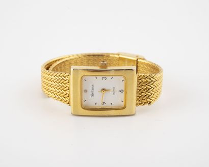 STELTMAN Ladies' wristwatch in gold-plated metal. 

Square case. 

Dial with white...