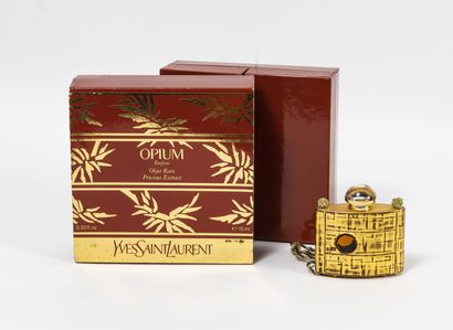 Yves Saint LAURENT Opium. 

Flacon de 15 ml de parfum. 

Édition limitée, numérotée...