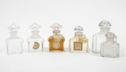 GUERLAIN & BACCARAT Lot de quatre flacons de parfum comprenant : 

- MITSOUKO. H....