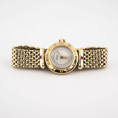 Tabbah Montre bracelet de dame en or jaune (750). 
Boîtier rond. 
Lunette gravée...