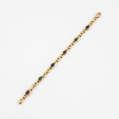 null Bracelet en or jaune (750) à maille haricot alternée de rubis, saphirs et émeraudes...