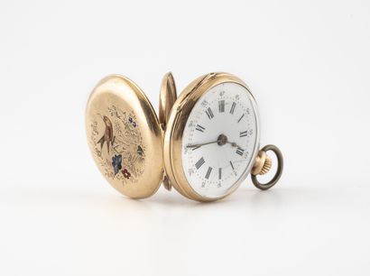  Yellow gold (750) collar watch. 
Back cover decorated with a bird, partly enamelled....