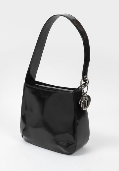 CHRISTIAN DIOR Vintage bag in black lacquered leather, rigid, with a shoulder strap....