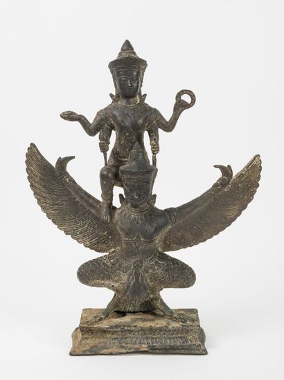 ASIE du SUD EST, XVIIIème ou XIXème siècle Visnu on Garuda in patinated bronze.

H....