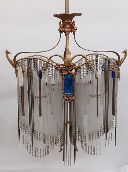 D'après Hector GUIMARD (1867-1942), Edition SOFAR A bronze frame chandelier with...