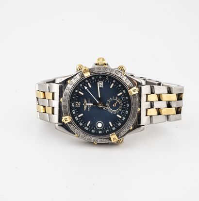 BREITLING 
Montre bracelet d'homme en acier bicolore.

Cadran à fond bleu nuit, signé,...