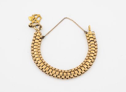 null Yellow gold (750) bracelet with fancy mesh and small yellow gold (750) pendant...
