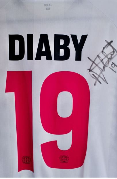 Moussa Diaby 
Bayer Leverkusen Away 2021-22 match shirt worn and signed by Moussa...