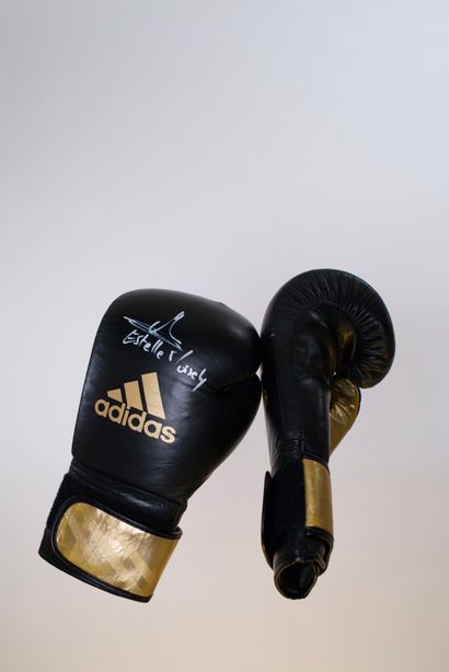 Estelle Mossely A pair of Adidas boxing gloves signed by Estelle Mossely, Olympic...