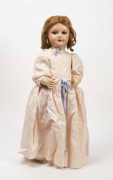 SFBJ 
Doll with composition head, open mouth, fixed blue eyes. 
Body in composition....