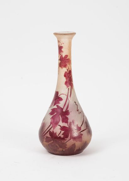 LEGRAS Soliflore vase with flat bottom.

Proof in garnet lined glass on a frosted...