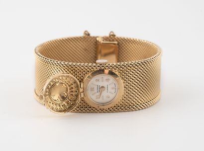 SURENA Genève Montre bracelet de dame en or jaune (750).

Cadran à fond satiné, signé,...