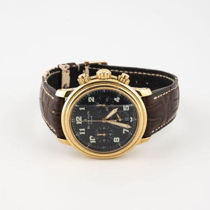 BLANCPAIN ''LEMAN FLYBACK'' N°285 
Chronograph watch in gold (750).

Black 3-counter...