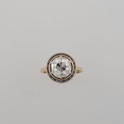 null Bague en or (750) et platine (850), ornée d'un diamant taille ancienne en serti...