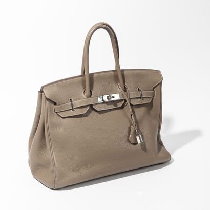 HERMÈS, Paris, Made in France. Birkin" bag 35 cm in grey Togo calf, white stitching....