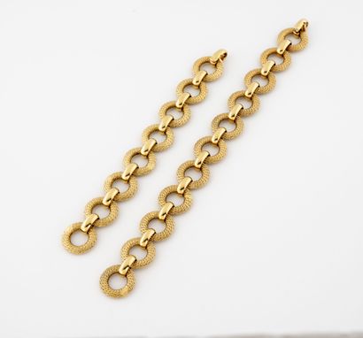FRED Paris Bracelet et collier composé de maillons ronds ciselés en or jaune (750).

Poids...