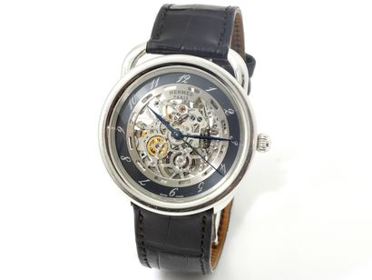 HERMÈS ''ARCEAU SQUELETTE'' Men's wrist watch in steel.

Skeleton dial with painted...