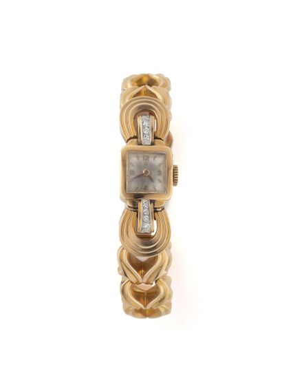 OMEGA Montre bracelet de dame en or (750). 

Cadran argenté taché avec chiffres arabes...