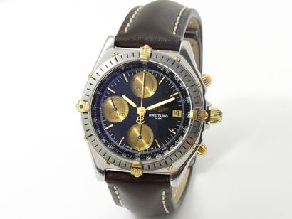 BREITLING ''CHRONOMAT'' Two-tone steel chronograph watch.

Slate grey 3-counter dial...