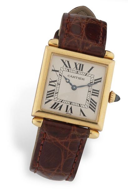 CARTIER ''TANK'' Men's wristwatch in gold (750).

Ivory dial with painted Roman numerals,...