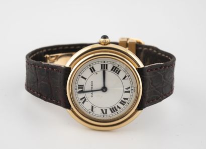 CARTIER Men's wristwatch in yellow gold (750). 

Dial with cream background, signed,...