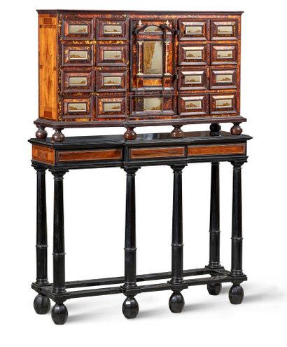 null - Cabinet with a slight central projection, opening with nine drawers on four...
