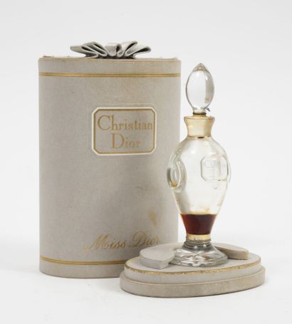 CHRISTIAN DIOR Miss Dior. 
Perfume, amphora bottle (three-quarters empty). 
In its...