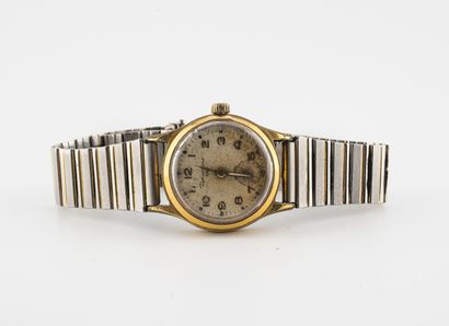 LIP, Dauphine Ladies' wristwatch in steel and gilded metal. 
Round case. 
Dial with...