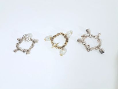 CARITA Set of three metal bracelets with charms. 
Carita, Gatineau and Charlie. 
Wear...