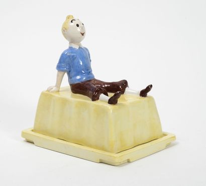 LA CHAISE LONGUE Beurrier Tintin, 1985.

Céramique polychrome pour un beurrier en...