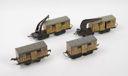 JEP Lot of four cattle cars, two with cranes. 
In lithographed sheet metal. Previously...