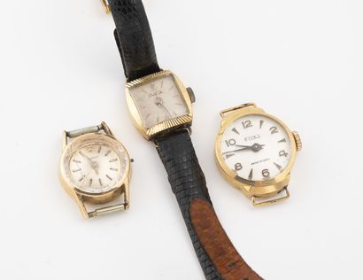 ELVES, TISSOT ou JIVAJA Lot of three ladies' wrist watches. 
Cases in yellow gold...
