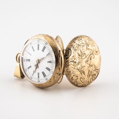  Yellow gold collar watch (750). 
Back cover decorated with foliage. 
White enamelled...