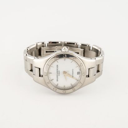 BAUME & MERCIER Ladies' wristwatch in steel. 
Round case. 
Dial with white mother-of-pearl...