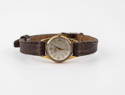 GIGANDER Lady's wrist watch. 
Round case in yellow gold (750). 
Dial with satin-finished...