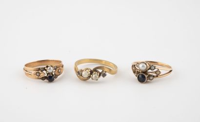  Lot of three rings in yellow gold (750) or yellow gold (750) and platinum (850),...