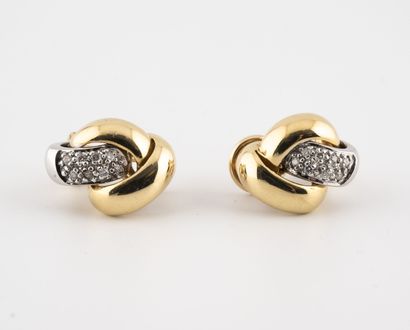 null Pair of yellow and white gold (750) ear clips set with small eight-eighths diamonds....