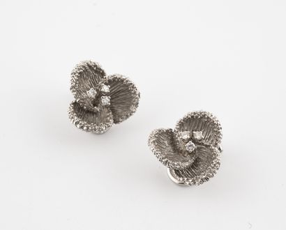 Pair of ear clips in textured white gold...