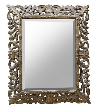 null Rectangular mirror with bevelled glass and carved, openwork and gilded wooden...