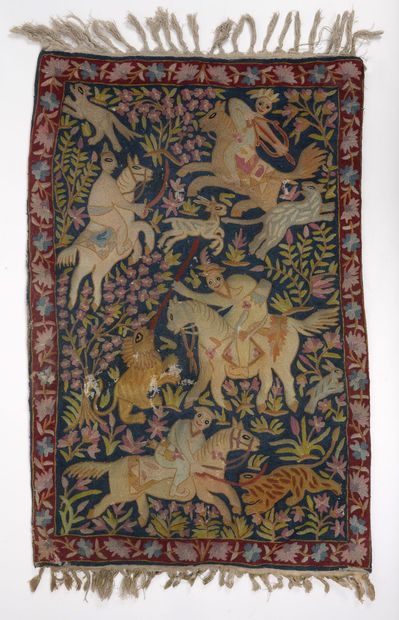 Suzani. 
Hunting with the lion. 
Floral border...