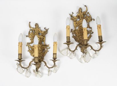 Pair of three-light sconces in bronze and...