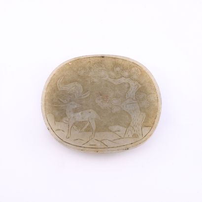 CHINE, XIXème-XXème siècles - Dix-sept jetons-pendants en jadéite ou néphrite gravés...