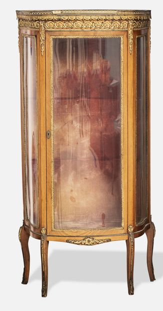FRANCE, vers 1900-1920 
Half-moon window in stained wood opening by a door, with...